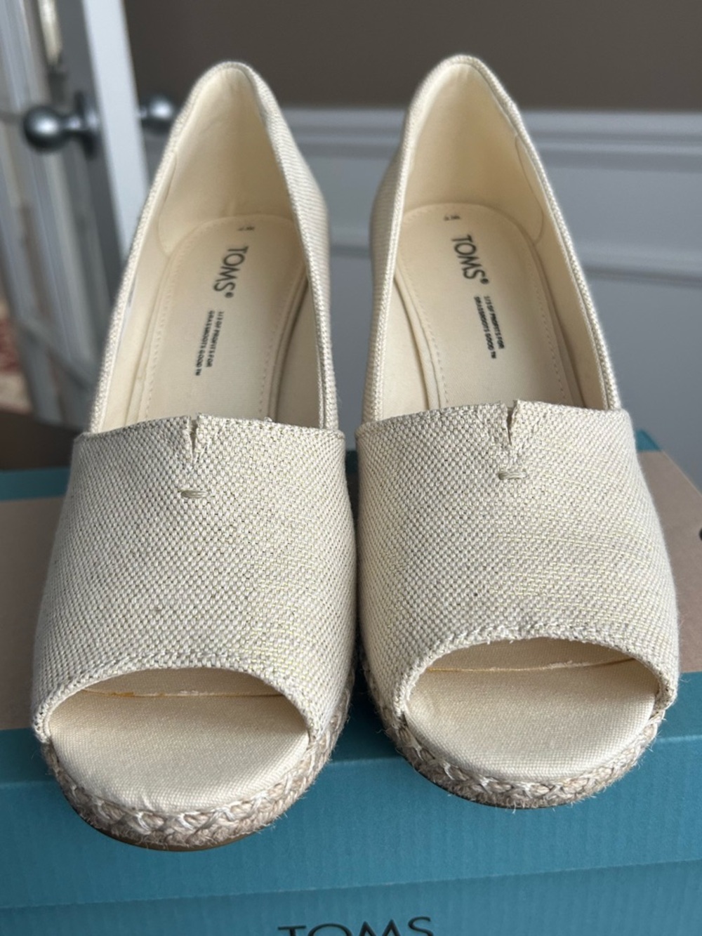 TOMS Cream with gold thread Peep Toe Espadrille Wedges size 7. Worn one time.